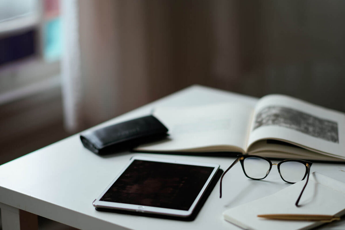 Books and tablet on a study desk